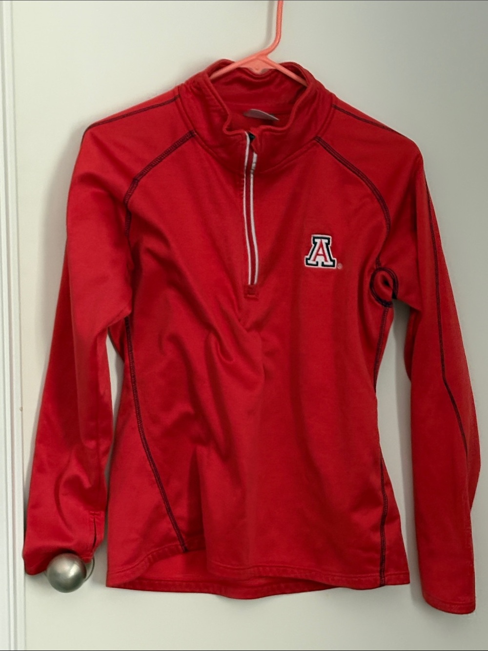U of A quarter zip with light fleece inside.